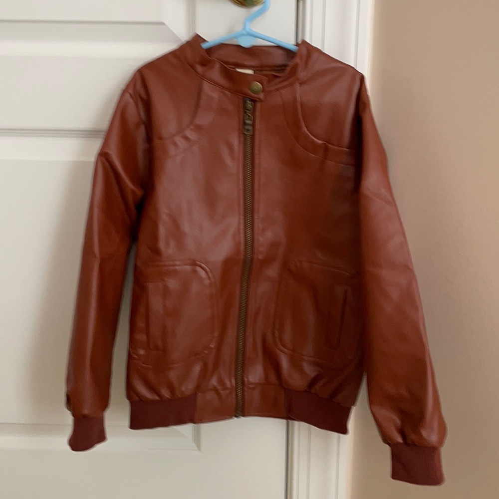 Faux Leather jacket. My son used it for his Indiana Jones Halloween costume.